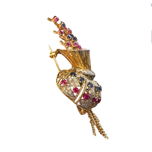 Alfinete em ouro, safiras e rubis