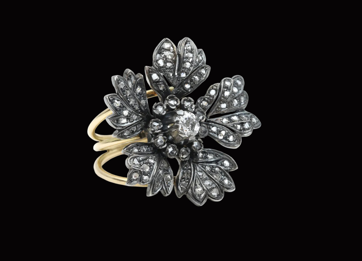 Diamond, silver and gold ring